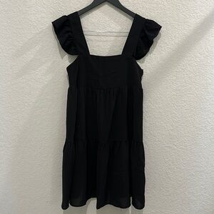 Sleeveless black dress in size M